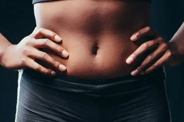 Toning Your Stomach: The Ultimate Guide to Achieving a Sculpted Stomach While Shedding Pounds 1 Image of a toned stomach after non surgical treatment Newport
